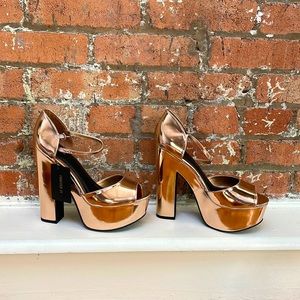 Rose gold mega platform shoes